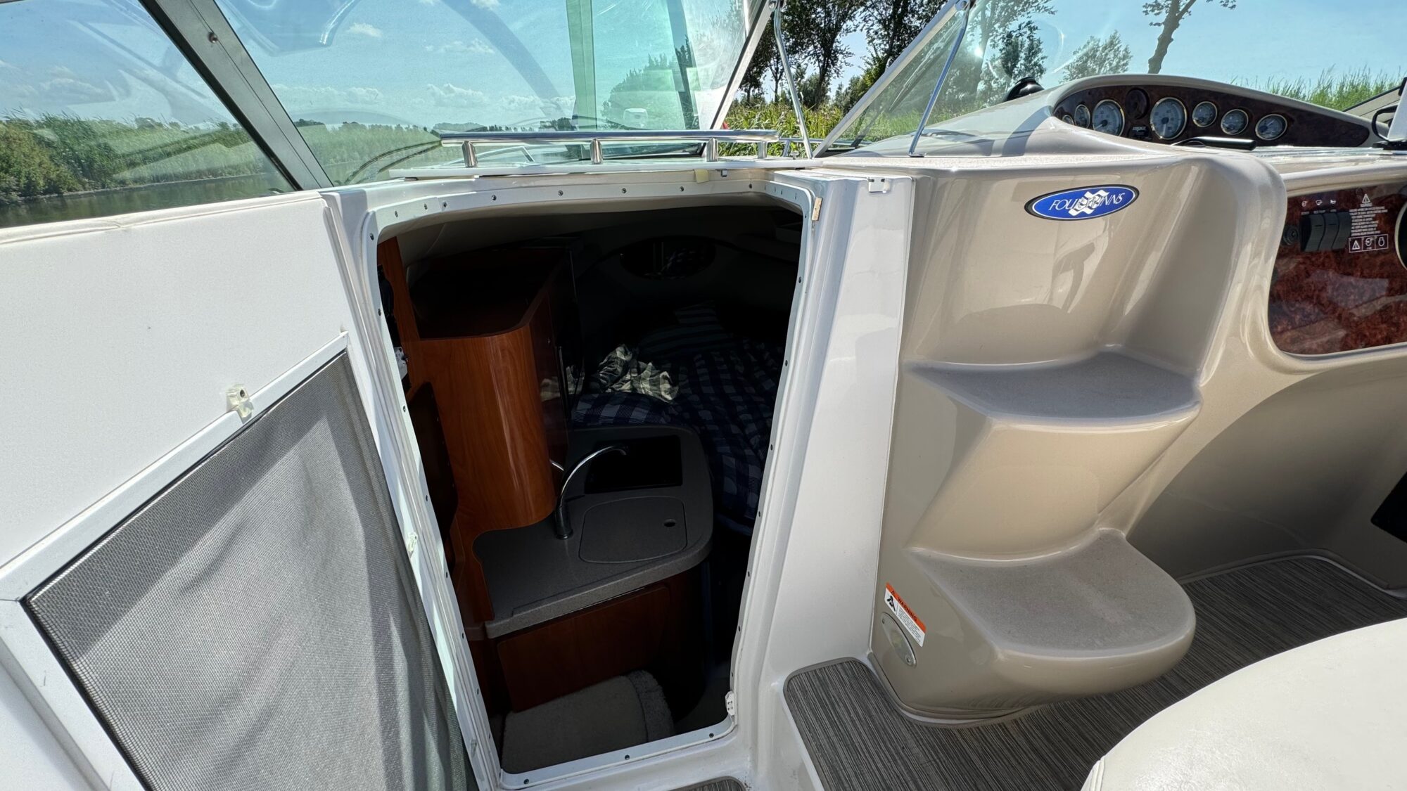 Four Winns 248 Vista 2005 – trailerbaar cruiser met hal-opslag - Foto 22