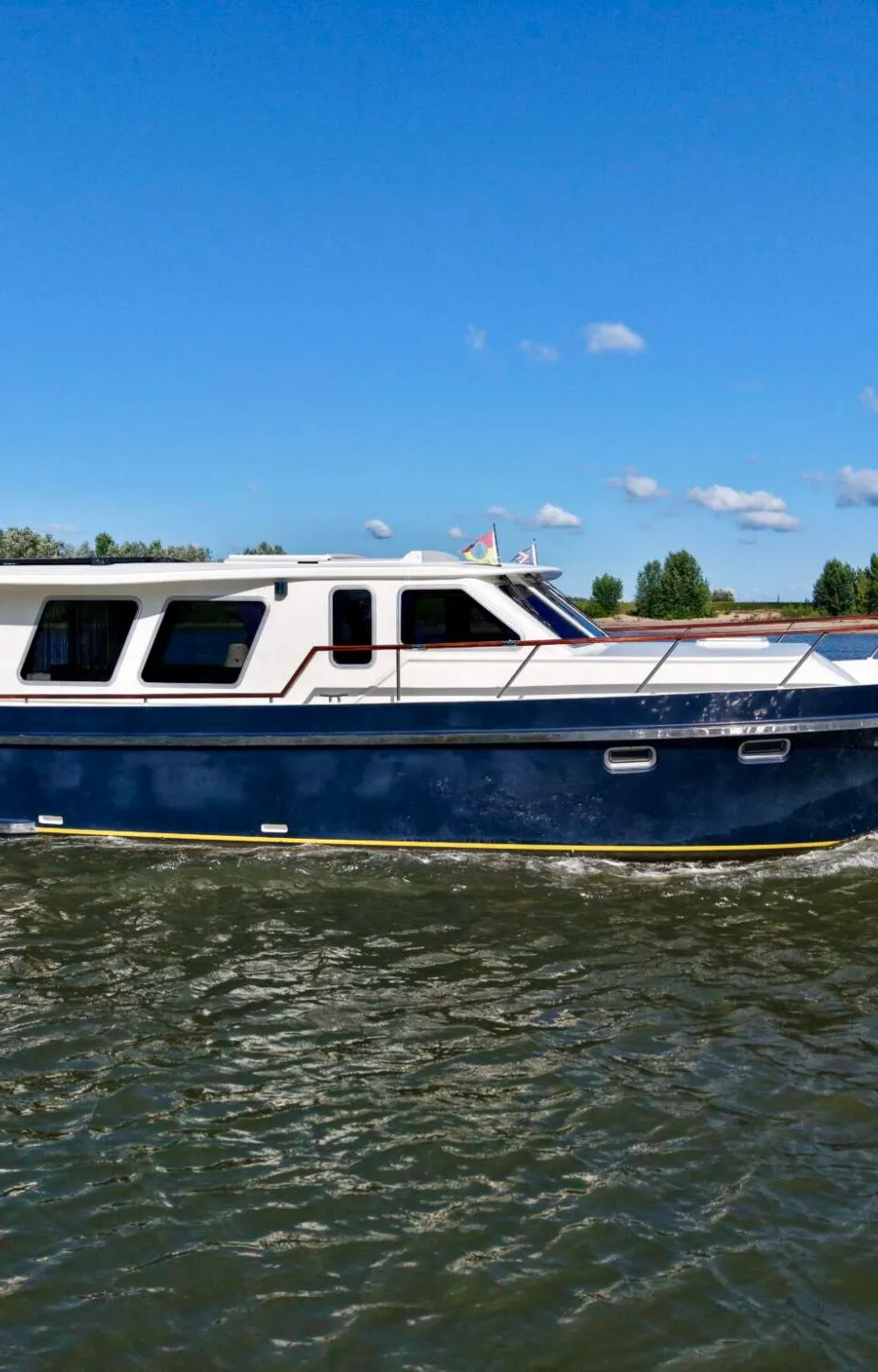 Tryvia 12.50 OK 2005 – ruime kajuitboot met stahoogte - Foto 1